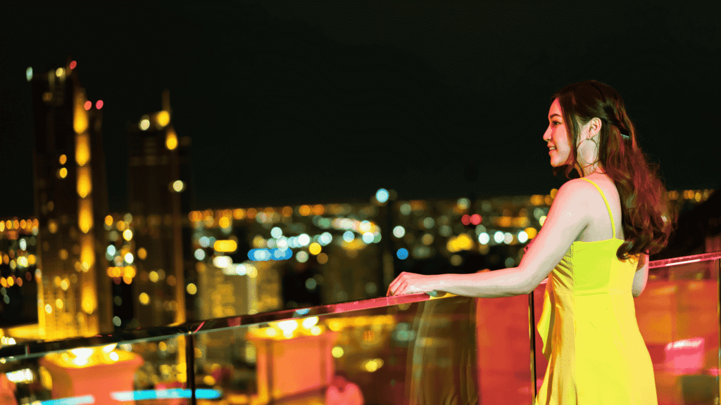 Elegant Woman in City Setting in night malaysia